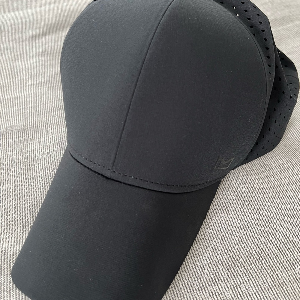 Melin A-Game Hydrolite Performance SnapBack Hat in Black